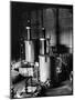 Large Cylinders, One W Man on Top Climbing Ladder at Westinghouse Plant-Alfred Eisenstaedt-Mounted Photographic Print