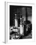 Large Cylinders, One W Man on Top Climbing Ladder at Westinghouse Plant-Alfred Eisenstaedt-Framed Photographic Print