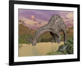 Large Dicraeosaurus Dinosaur Drinking Water-null-Framed Art Print