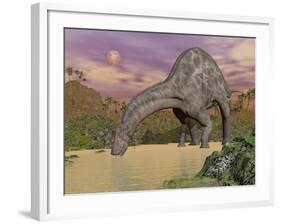 Large Dicraeosaurus Dinosaur Drinking Water-null-Framed Art Print