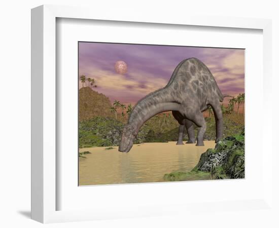 Large Dicraeosaurus Dinosaur Drinking Water-null-Framed Art Print