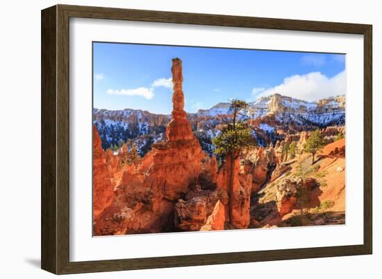 Large Hoodoo Lit by Early Morning Sun, with Snow and Pine Trees, Peekaboo Loop Trail-Eleanor Scriven-Framed Photographic Print