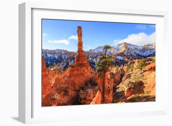 Large Hoodoo Lit by Early Morning Sun, with Snow and Pine Trees, Peekaboo Loop Trail-Eleanor Scriven-Framed Photographic Print