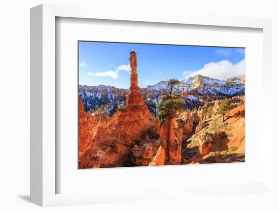 Large Hoodoo Lit by Early Morning Sun, with Snow and Pine Trees, Peekaboo Loop Trail-Eleanor Scriven-Framed Photographic Print