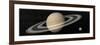 Large Planet Saturn and its Rings Next to Small Planet Earth-null-Framed Art Print