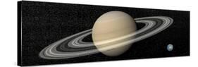 Large Planet Saturn and its Rings Next to Small Planet Earth-null-Stretched Canvas