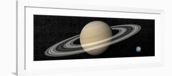 Large Planet Saturn and its Rings Next to Small Planet Earth-null-Framed Premium Giclee Print