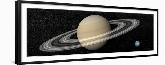 Large Planet Saturn and its Rings Next to Small Planet Earth-null-Framed Premium Giclee Print