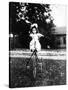 Large Play Doll Sits on a Period Tricycle, Ca. 1925-null-Stretched Canvas