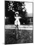 Large Play Doll Sits on a Period Tricycle, Ca. 1925-null-Mounted Photographic Print