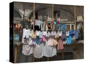 Large Quantity of Laundry Hanging from the Balcony of a Crumbling Building, Habana Vieja, Cuba-Eitan Simanor-Stretched Canvas