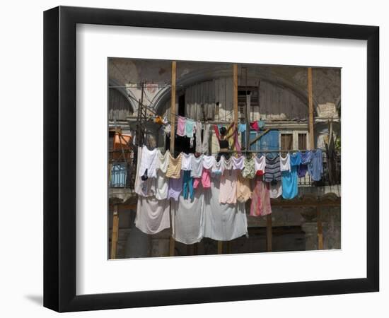 Large Quantity of Laundry Hanging from the Balcony of a Crumbling Building, Habana Vieja, Cuba-Eitan Simanor-Framed Photographic Print