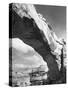 Large Rock Formation Forming a Bridge across Desert-Loomis Dean-Stretched Canvas