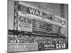 Large Scoreboard Towering over Fans Showing Baseball Scores from Around the League-Wallace Kirkland-Mounted Photographic Print