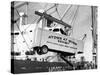 Large Transport Truck Bed Dangling in Midair-null-Stretched Canvas