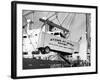 Large Transport Truck Bed Dangling in Midair-null-Framed Photographic Print