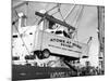 Large Transport Truck Bed Dangling in Midair-null-Mounted Photographic Print