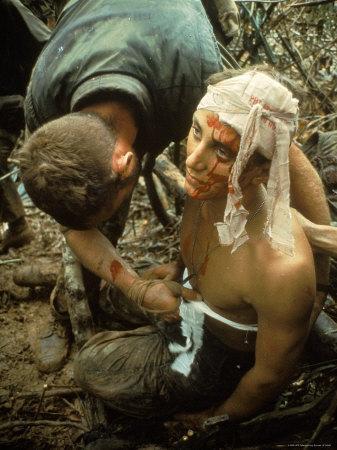 Wounded Marine Being Bandaged in Muddy Jungle During OP Prairie US Military Sweep South of DMZ