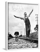 Larry Jim Holm with Dunk, His Spaniel Collie Mix, Walking Rail of Railroad Tracks in Rural Area-Myron Davis-Framed Photographic Print