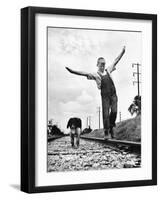 Larry Jim Holm with Dunk, His Spaniel Collie Mix, Walking Rail of Railroad Tracks in Rural Area-Myron Davis-Framed Photographic Print