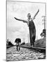 Larry Jim Holm with Dunk, His Spaniel Collie Mix, Walking Rail of Railroad Tracks in Rural Area-Myron Davis-Mounted Photographic Print