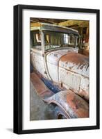 Latah, Washington State, USA. Rusted vintage Ford Model A pickup truck in a barn-Emily Wilson-Framed Photographic Print