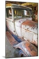 Latah, Washington State, USA. Rusted vintage Ford Model A pickup truck in a barn-Emily Wilson-Mounted Photographic Print