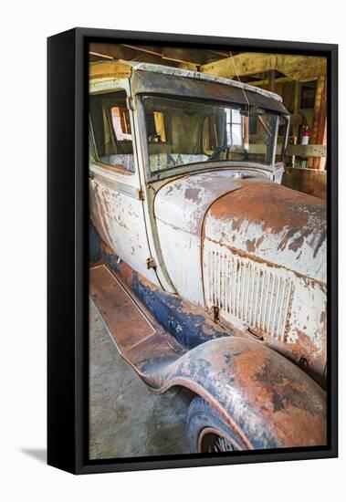Latah, Washington State, USA. Rusted vintage Ford Model A pickup truck in a barn-Emily Wilson-Framed Stretched Canvas