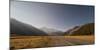 Late afternoon sun over a long straight road into the mountains, South Island, New Zealand, Pacific-Logan Brown-Mounted Photographic Print