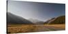 Late afternoon sun over a long straight road into the mountains, South Island, New Zealand, Pacific-Logan Brown-Stretched Canvas