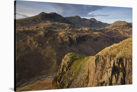 Late evening light on the Scafells from above Hardknott Fort, Lake District National Park, Cumbria,-Jon Gibbs-Stretched Canvas