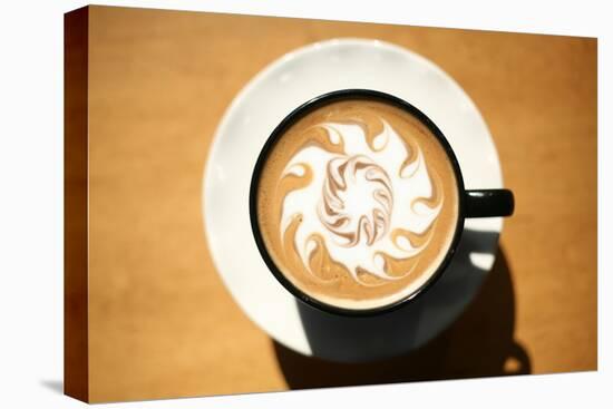 Latte Art, Designs Drawn With Steamed Milk In Hot Fresh Rich Coffee In A Ceramic Coffee Cup-mikeledray-Stretched Canvas