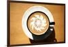 Latte Art, Designs Drawn With Steamed Milk In Hot Fresh Rich Coffee In A Ceramic Coffee Cup-mikeledray-Framed Art Print