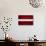 Latvia Flag Design with Wood Patterning - Flags of the World Series-Philippe Hugonnard-Art Print displayed on a wall