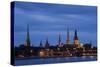 Latvia, Riga, Western Daugava River and Spires of Old Town, Illuminated at Night-null-Stretched Canvas