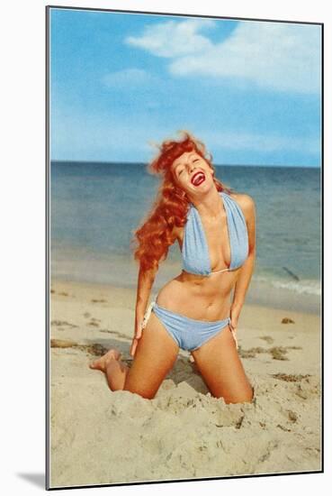 Laughing Redhead on Beach-null-Mounted Art Print