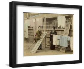 Laundry Day in Japan: Two Women Hang Up Clothes and Fabric to Dry Outdoors-null-Framed Photographic Print