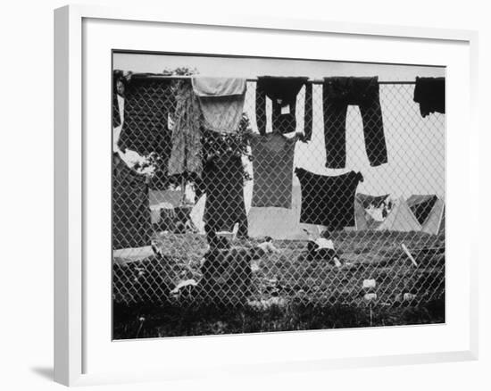 Laundry Hanging on Fence at Woodstock Music Festival-Bill Eppridge-Framed Photographic Print