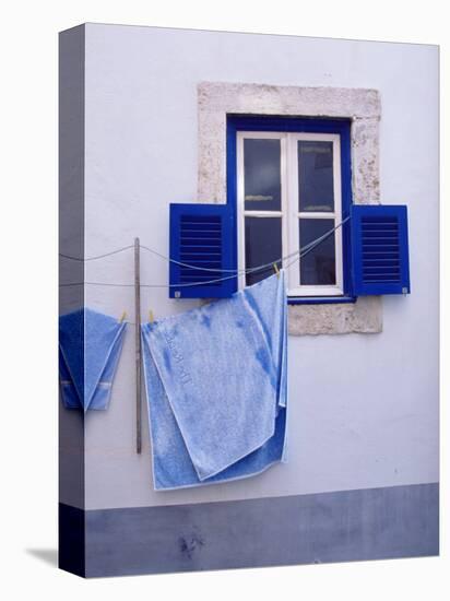 Laundry Hanging on Line at Window in the Moorish Quarter of Alfama, Lisbon, Portugal-Yadid Levy-Stretched Canvas