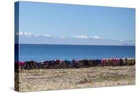 Laundry Hangs on a Wall on Isla Del Sol Along the Edge of Lake Titicaca-Alex Saberi-Stretched Canvas