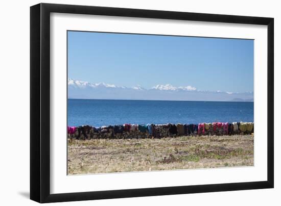 Laundry Hangs on a Wall on Isla Del Sol Along the Edge of Lake Titicaca-Alex Saberi-Framed Photographic Print