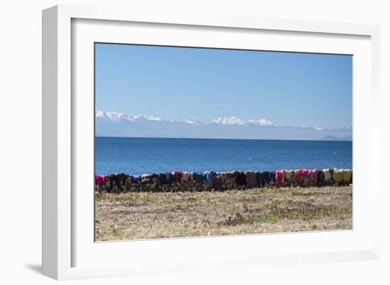 Laundry Hangs on a Wall on Isla Del Sol Along the Edge of Lake Titicaca-Alex Saberi-Framed Photographic Print