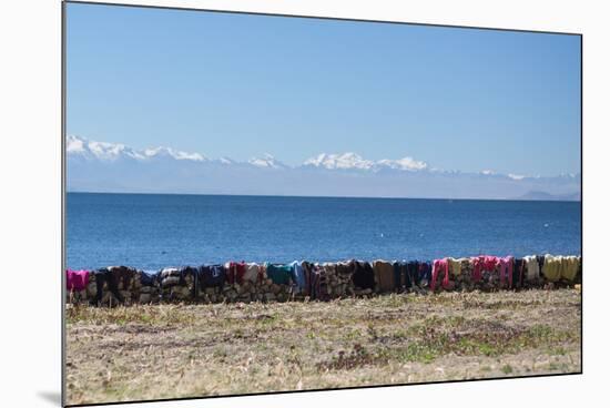 Laundry Hangs on a Wall on Isla Del Sol Along the Edge of Lake Titicaca-Alex Saberi-Mounted Photographic Print