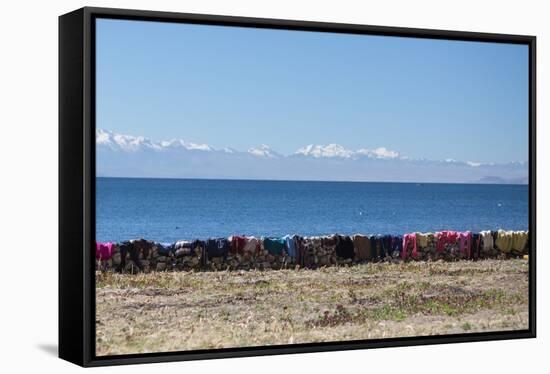 Laundry Hangs on a Wall on Isla Del Sol Along the Edge of Lake Titicaca-Alex Saberi-Framed Stretched Canvas