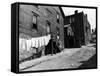 Laundry on Clothesline Hanging Along Wall of Wooden House in Worker Housing in Steel Town-Alfred Eisenstaedt-Framed Stretched Canvas