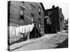 Laundry on Clothesline Hanging Along Wall of Wooden House in Worker Housing in Steel Town-Alfred Eisenstaedt-Stretched Canvas