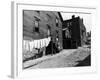 Laundry on Clothesline Hanging Along Wall of Wooden House in Worker Housing in Steel Town-Alfred Eisenstaedt-Framed Premium Photographic Print