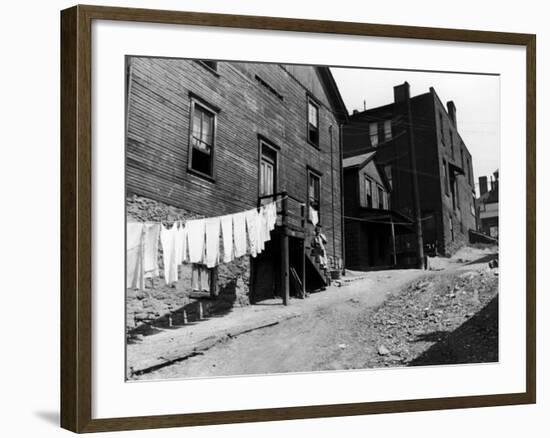 Laundry on Clothesline Hanging Along Wall of Wooden House in Worker Housing in Steel Town-Alfred Eisenstaedt-Framed Premium Photographic Print