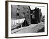 Laundry on Clothesline Hanging Along Wall of Wooden House in Worker Housing in Steel Town-Alfred Eisenstaedt-Framed Premium Photographic Print