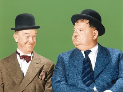 https://imgc.allpostersimages.com/img/posters/laurel-and-hardy-from-left-stan-laurel-oliver-hardy-ca-early-1940s_u-L-Q1BUCCM0.jpg?artPerspective=n